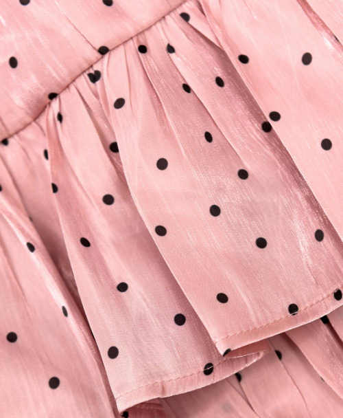 Krátka ružová volánová sukňa s malými bodkami